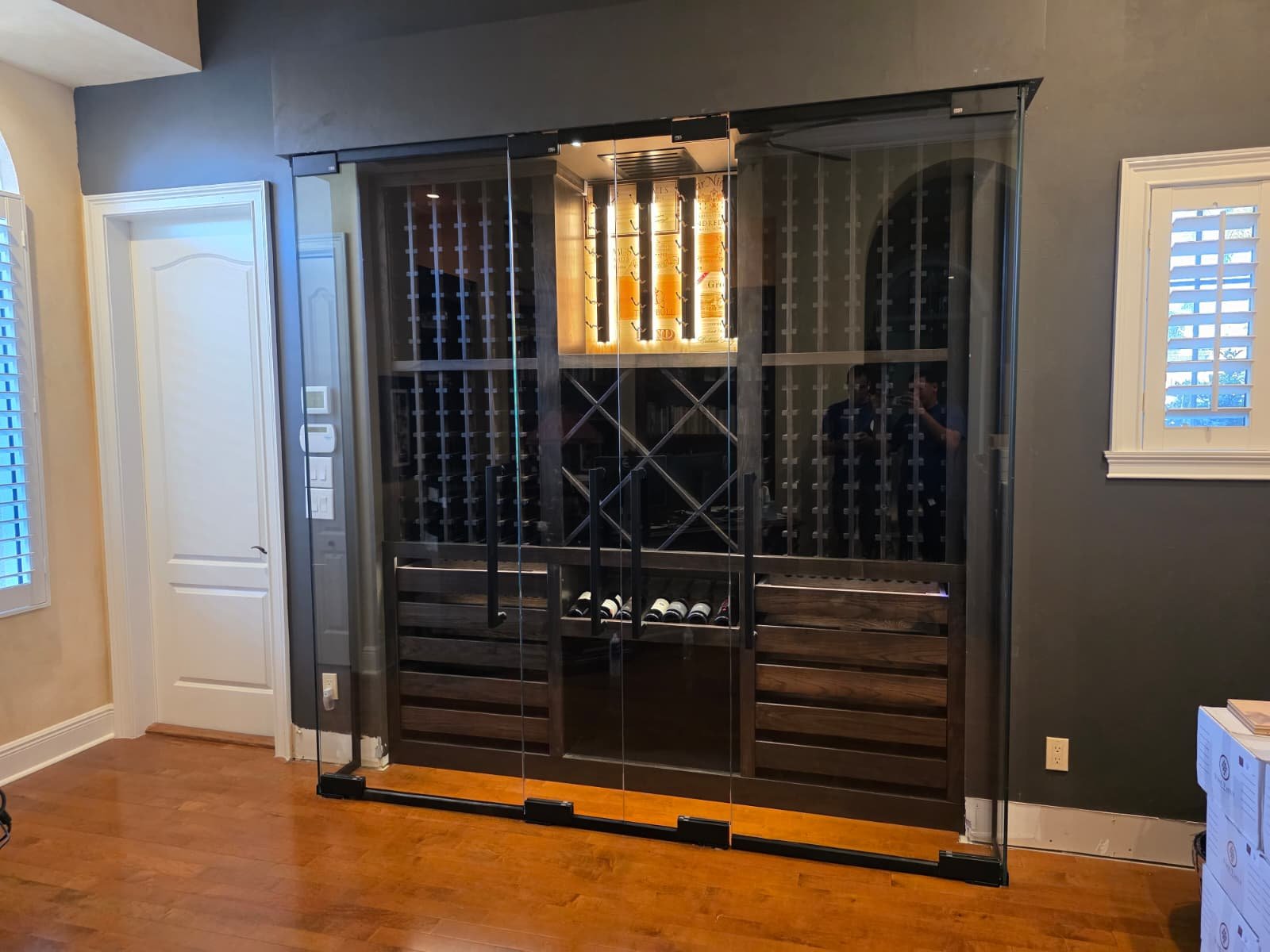 Custom walk-in closet shelving assembly